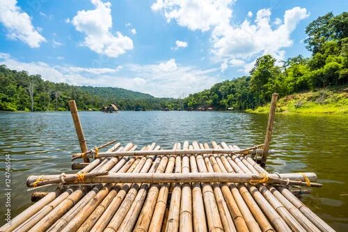 Плот деревянный фото Bamboo raft heading on lake Stock Photo Adobe Stock