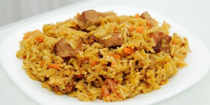 Плов из говядины фото Безумно вкусное и сытное блюдо - плов с говядиной. Его можно приготовить, как на