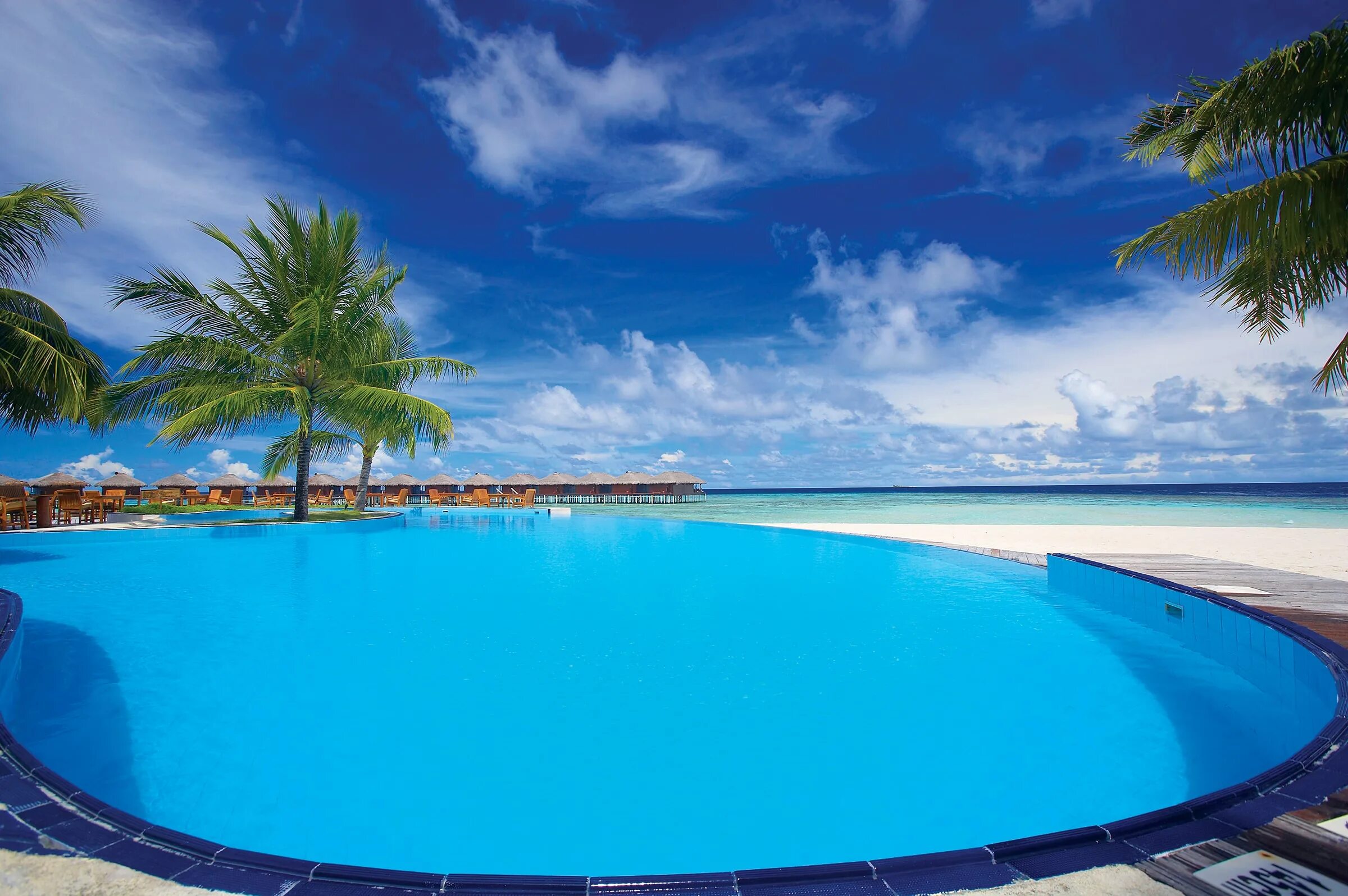 Пляж бассейн фото Filitheyo Island Resort 4* - Мальдивы, Фаафу - Отели Пегас Туристик