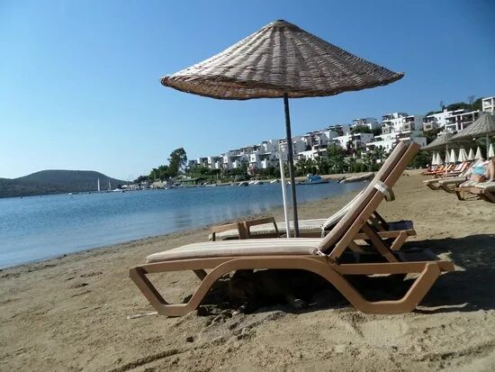 Пляж лежак фото gommone - Picture of Bitez Beach, Bodrum City - Tripadvisor
