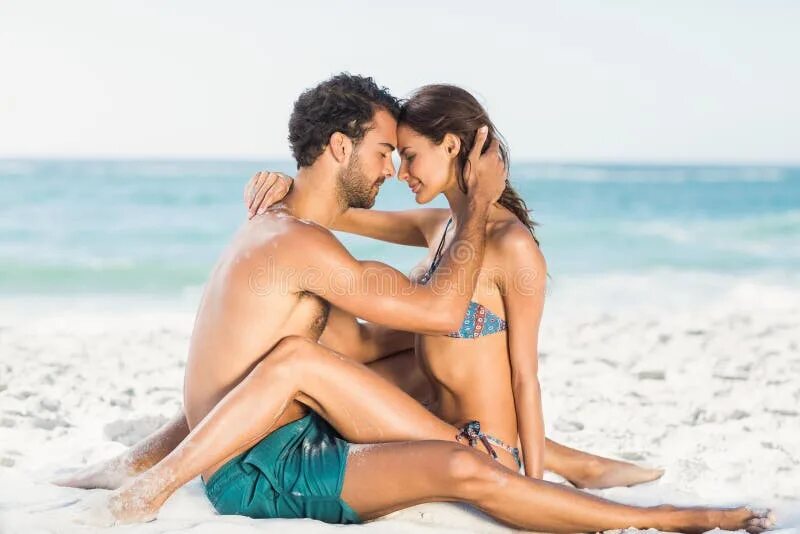 Пляж мжм фото Cute Couple Hugging Sitting on the Beach Stock Image - Image of female, blue: 68