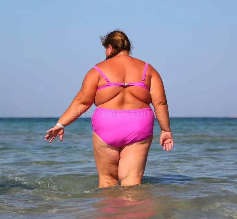 Пляж толстые женщины фото Overweight Woman Sitting on Beach Stock Image - Image of blue, happiness: 862122