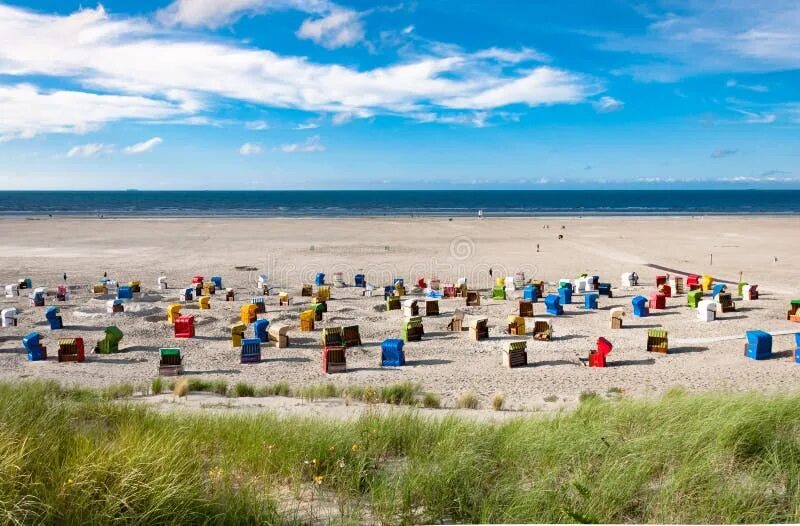 Пляжи германии фото Beach Chairs at the Island of Juist in Germany Stock Photo - Image of beachgrass