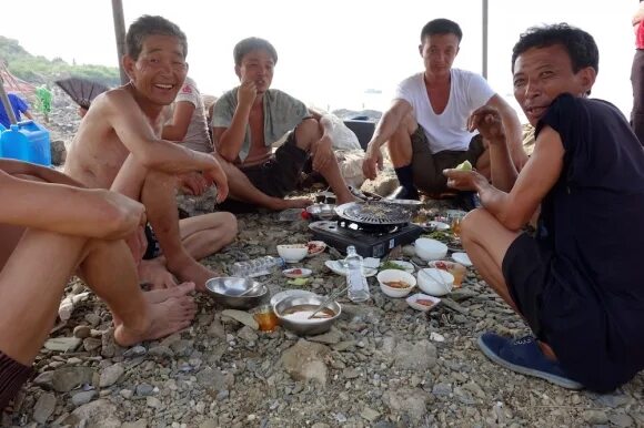 Пляжи северной кореи фото Take a glimpse at authentic, unstaged beach scenes from North Korea