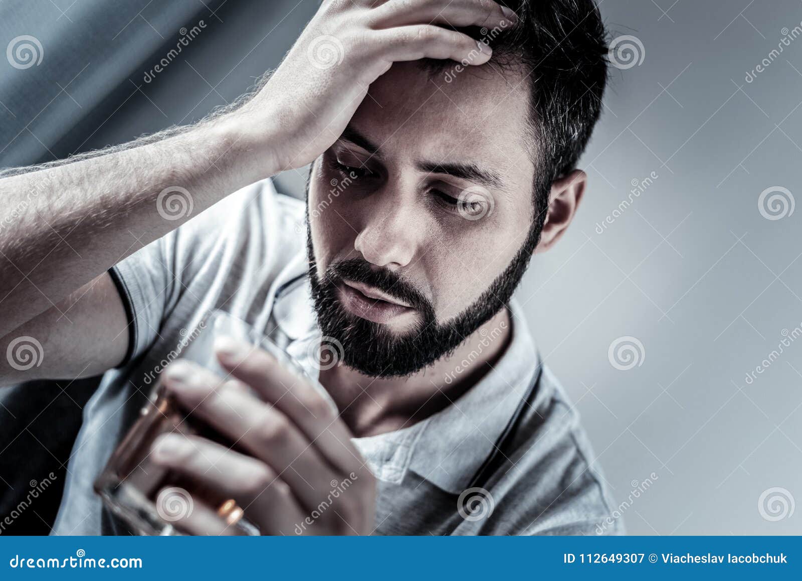 Почему бывший смотрит фото Frustrated Unshaken Man Supporting Head and Looking at Glass. Stock Image - Imag