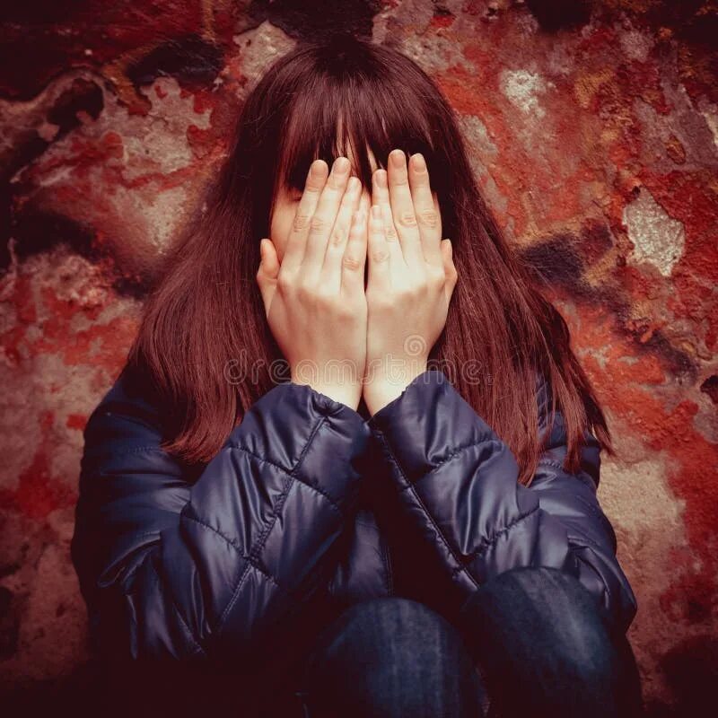 Почему закрытое лицо фото Girl with Hands Over Eyes Near Wall Outdoors Stock Photo - Image of ache, jacket