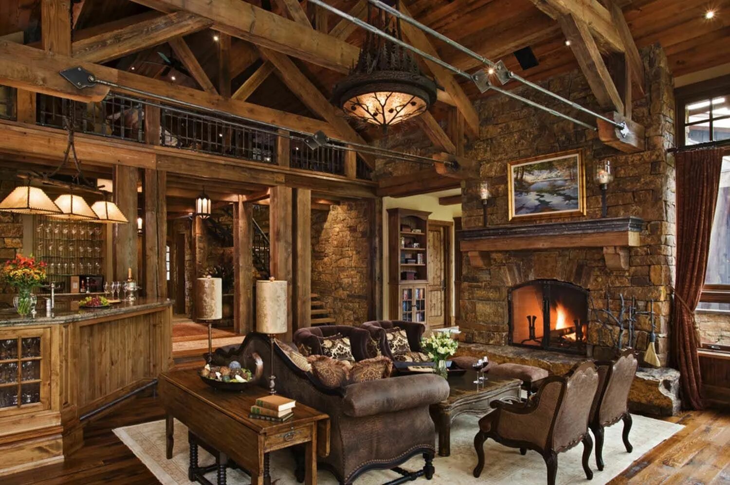 Под старину частные дома фото Striking rustic stone and timber dwelling in Ontario, Canada Rustic living room 