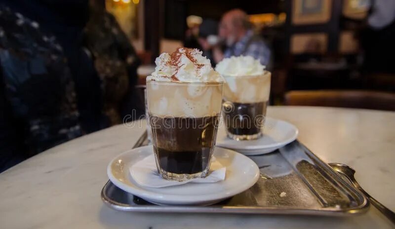 Подача кофе фото Vienna Coffee with Whipped Milk and Orange Liqueur Editorial Stock Image - Image