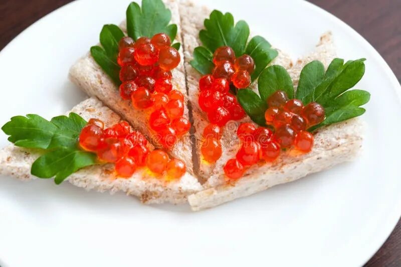 Подача красной икры на праздничный стол фото Tartlets with Caviar and Parsley on a Plate Stock Image - Image of group, gourme