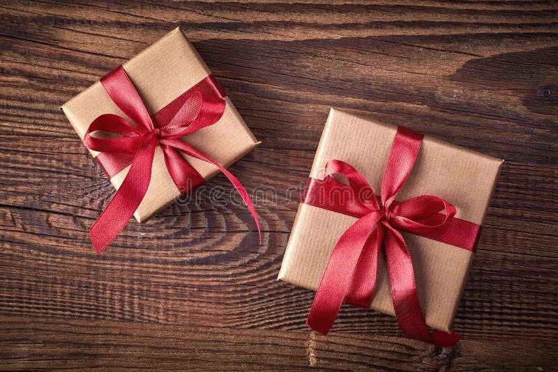 Подарок в виде фото Brown gift boxes stock photo. Image of paper, isolated - 65357282