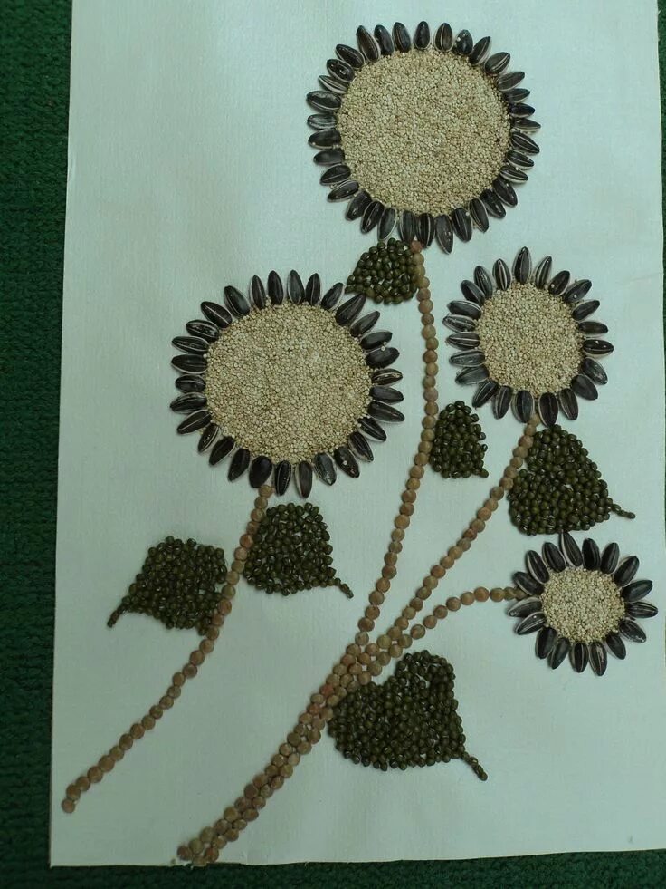 Поделка из косточек арбуза фото Girasoles, realizada con recursos de la naturaleza como las semillas de fréjol m