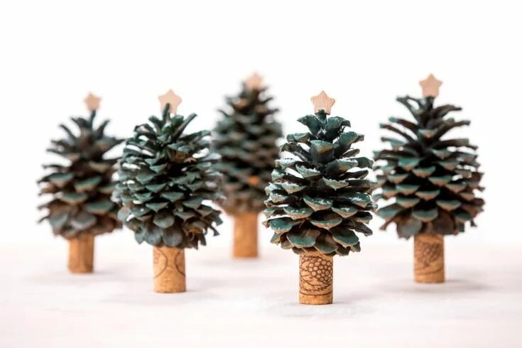 Поделки из шишек фото Pinecone Christmas trees: A forest of holiday decor Pine cone christmas tree, Co