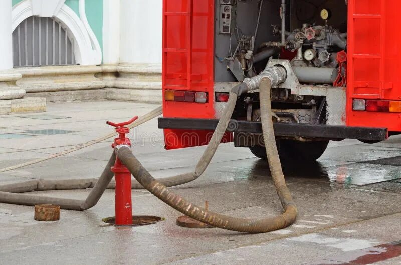 Подключение гидранта к пожарной машине Fire Hydrant - a Device for Sampling Water. Stock Photo - Image of pressure, flo