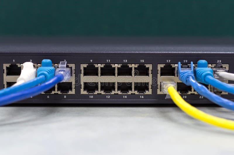 Подключения через лан Part of Network Switch 24 Ports with LAN Cable Stock Photo - Image of technology