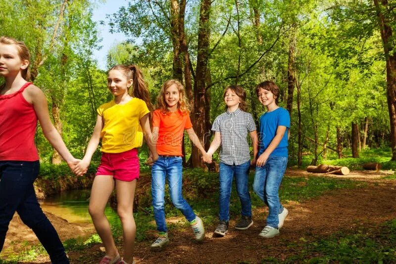 Подростки в лесу фото Happy Boys and Girls Walking in the Summer Forest Stock Photo - Image of childho