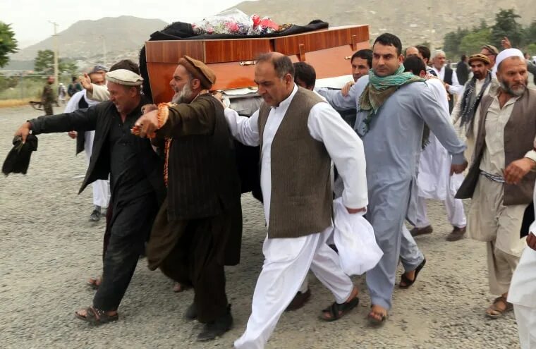 Похороны в турции фото Three Blasts in Kabul Rock Funeral for Politician's Son