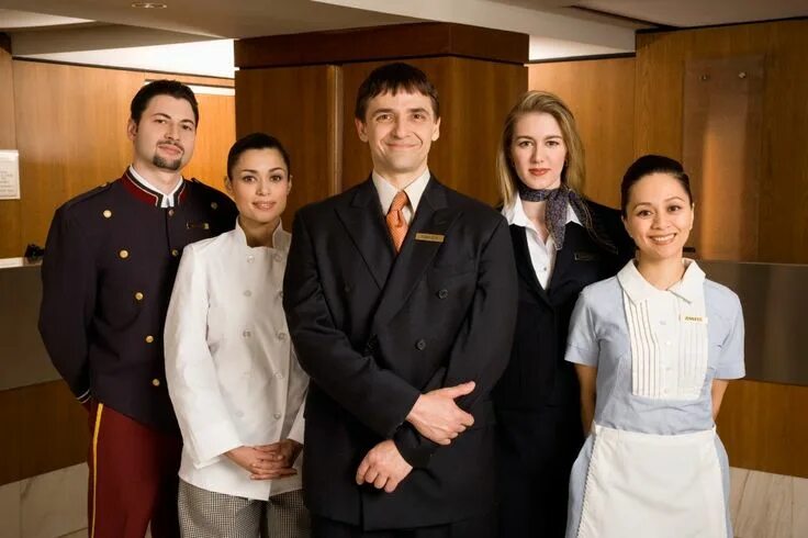 Поиск отеля по фото Portrait of friendly hotel staff Hotel staff, Hospitality management, Hotel