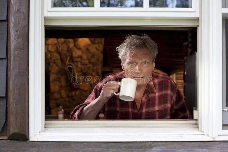 Покажи фото человека за окном Man with Coffee Cup Looking Out of Window Stock Photo - Image of camera, indoors