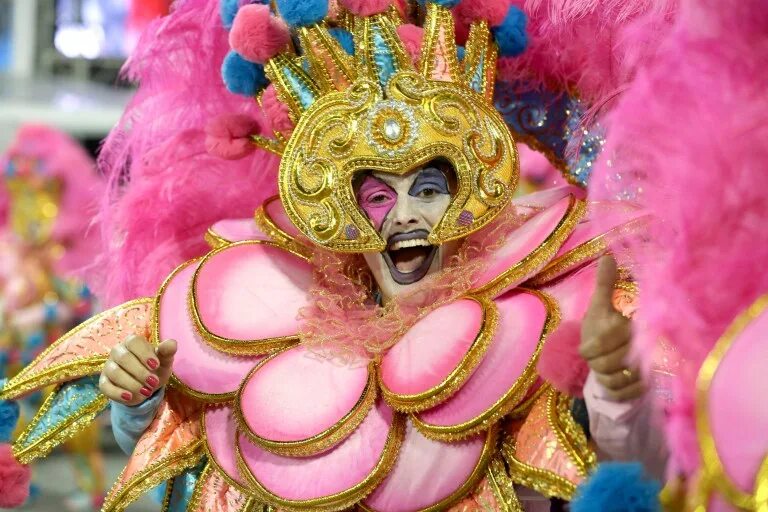 Thousands flood downtown streets in Brazil for unofficial Carnival celebrations 