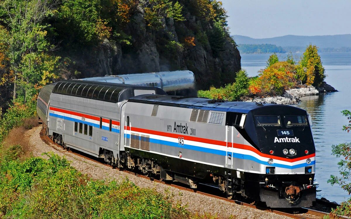 Покажи фото поезда Gaze at Stunning Fall Foliage Aboard Amtrak's Vintage Great Dome Train