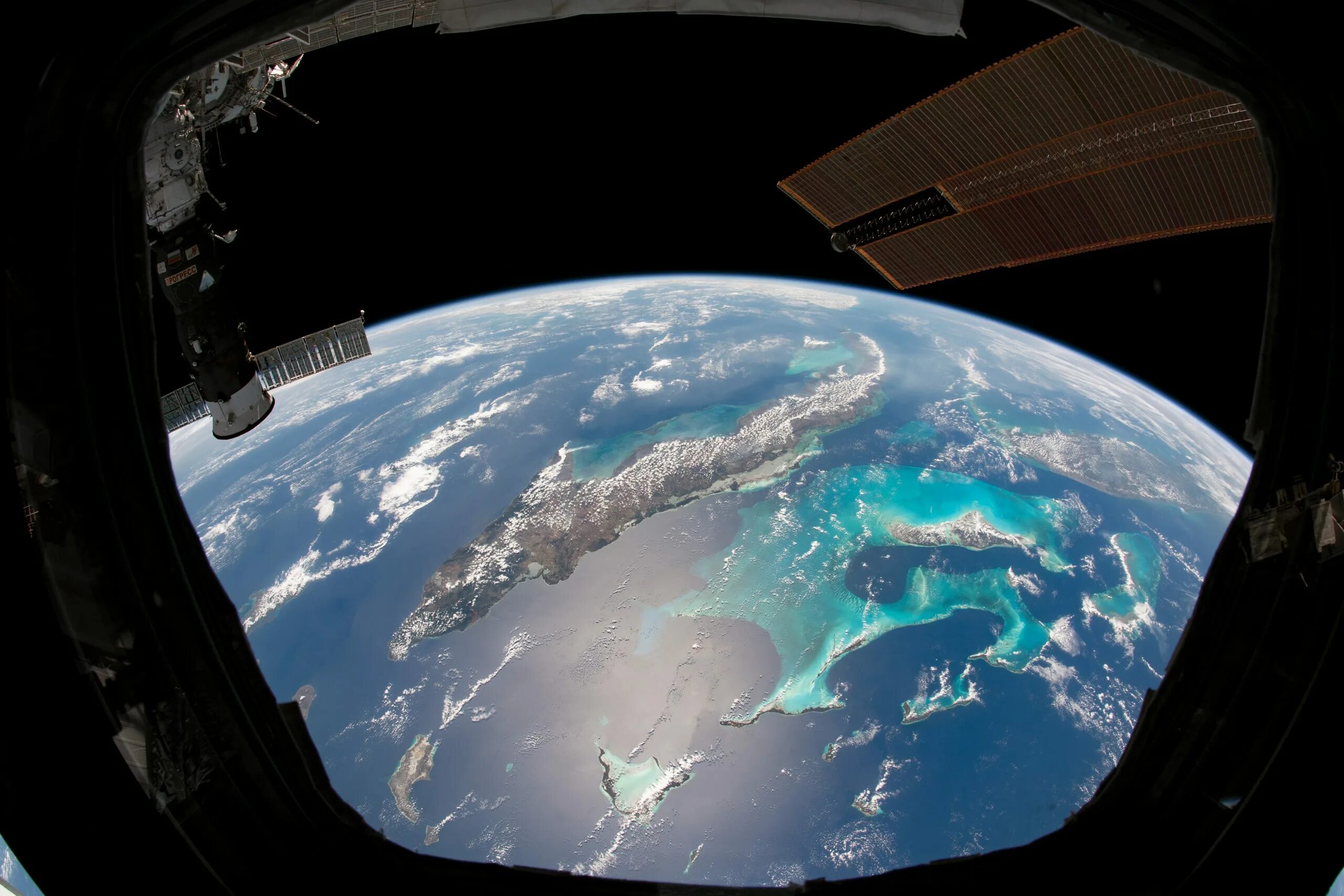 Покажи фото земли из космоса Clear blue waters illuminate the Caribbean Sea - Earth.com