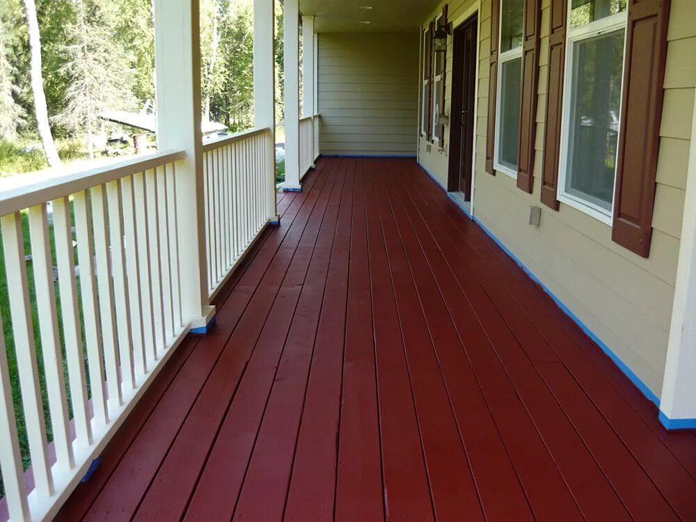 Покраска веранды деревянного дома фото Red stained deck