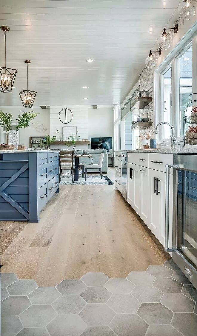 Пол на кухне дизайн Kitchen Flooring is Ragno Hexagon Tiles and River Shores Wood Floor. Home Bunch 