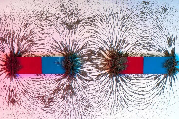 Поле магнита фото Iron filings on the magnetic field on a magnet. Magnetic force field around two 