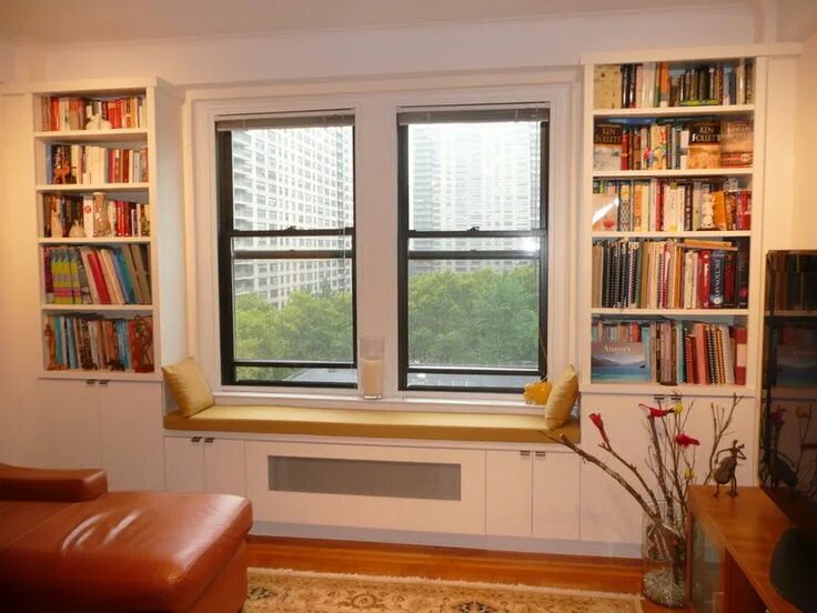 Полки возле окна фото NYC: Custom Built In Radiator Covers Window Seats Under & Around Window Bookcase