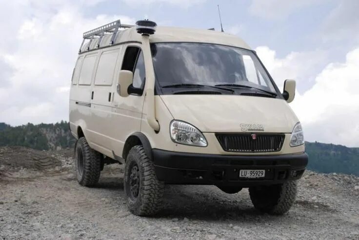 Полноприводная газель тюнинг White Van Parked on Rocky Hill