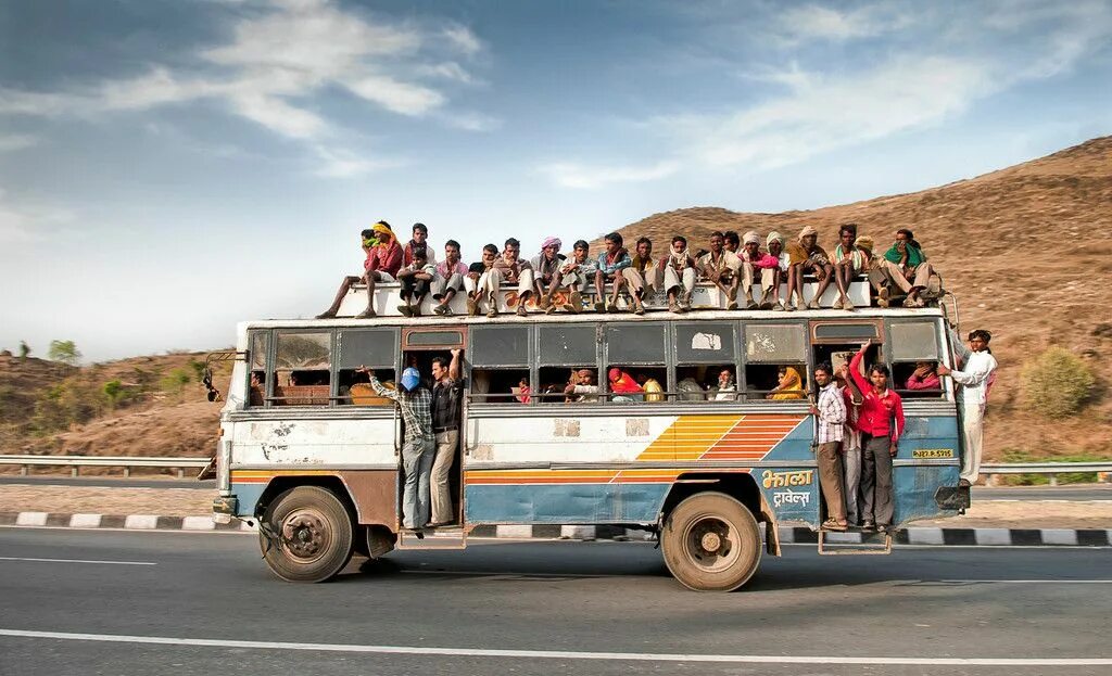 Полный автобус людей фото Public buses in India as seen in this image can sometimes be a little overcrowde