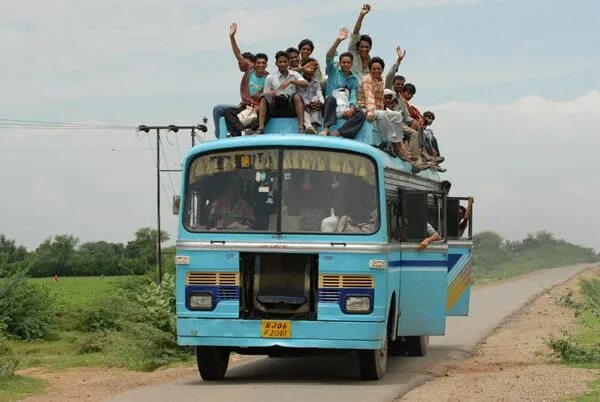 Полный автобус людей фото Transportation: This is a picture of people riding the bus. In urban areas they'