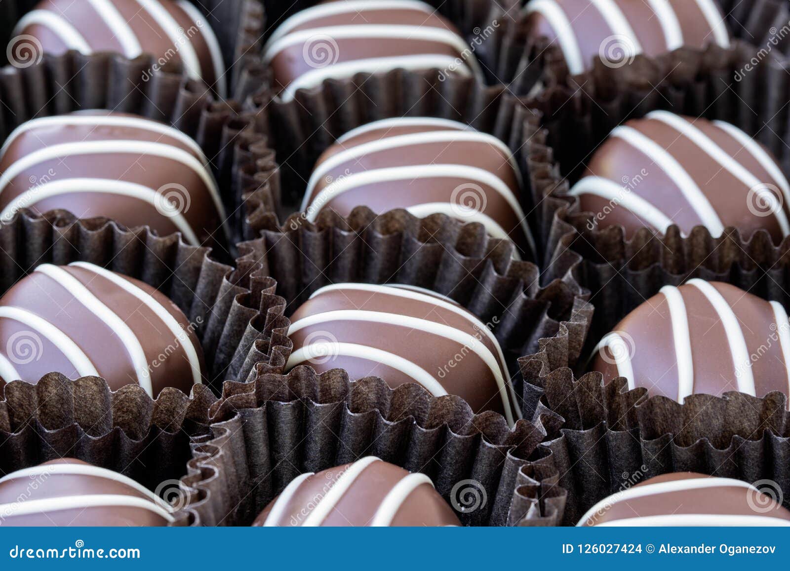 Полосатый шоколад фото Up Close Macro of Chocolates Stock Photo - Image of stripes, blueberry: 12602742