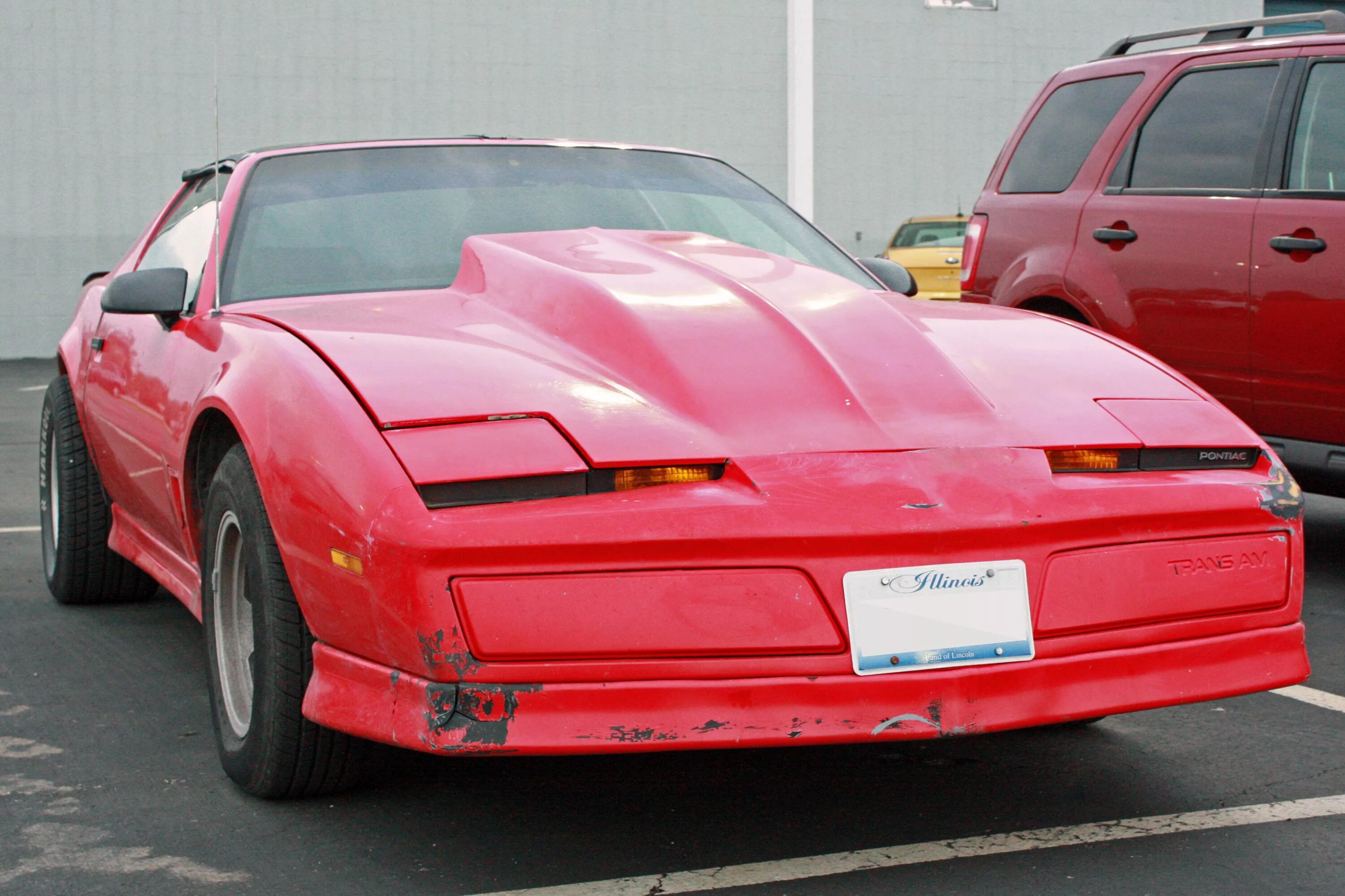 Понтиак тюльпан фото File:Red Pontiac Firebird.jpg - Wikimedia Commons