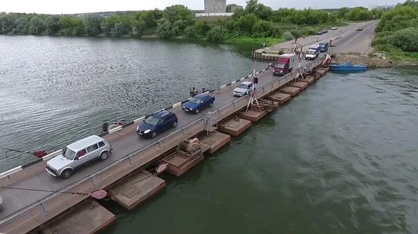 Понтонный мост фото Floating bridge over the Don River near the village of Novozhivotinnoye in the R