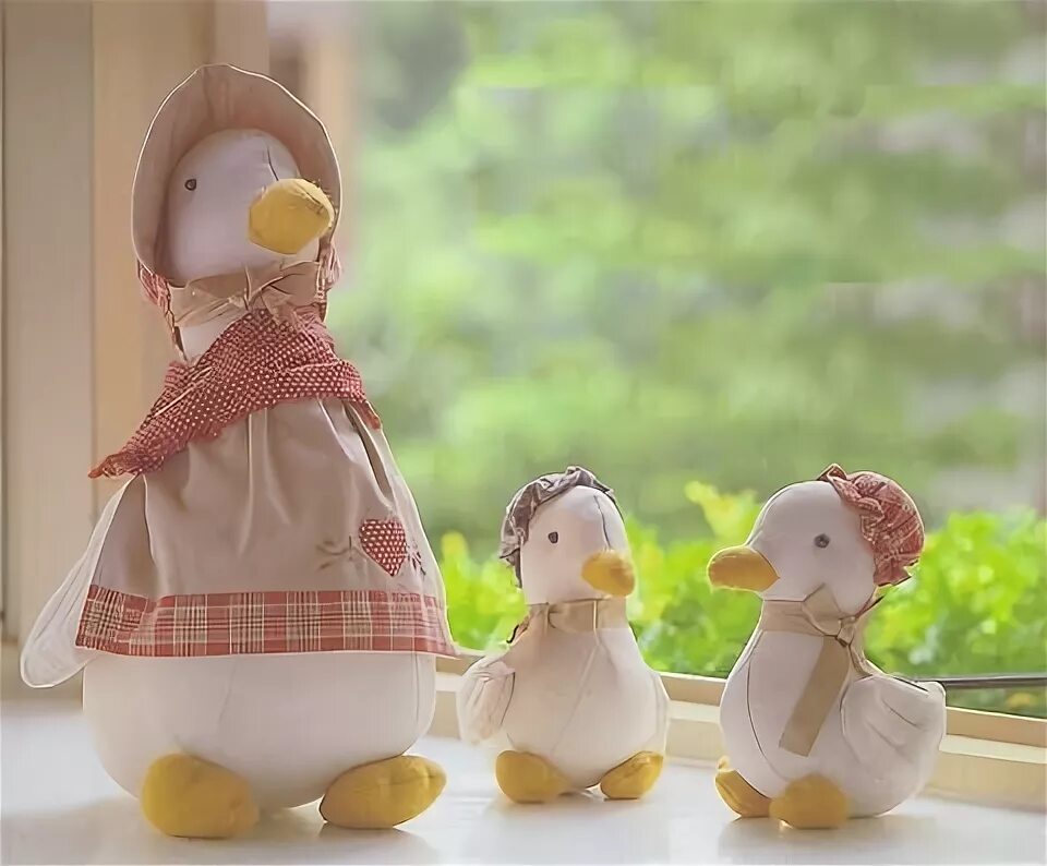 Пошив игрушки уточка своими руками для декора Three Adorable Stuffed Animals on a Window Sill