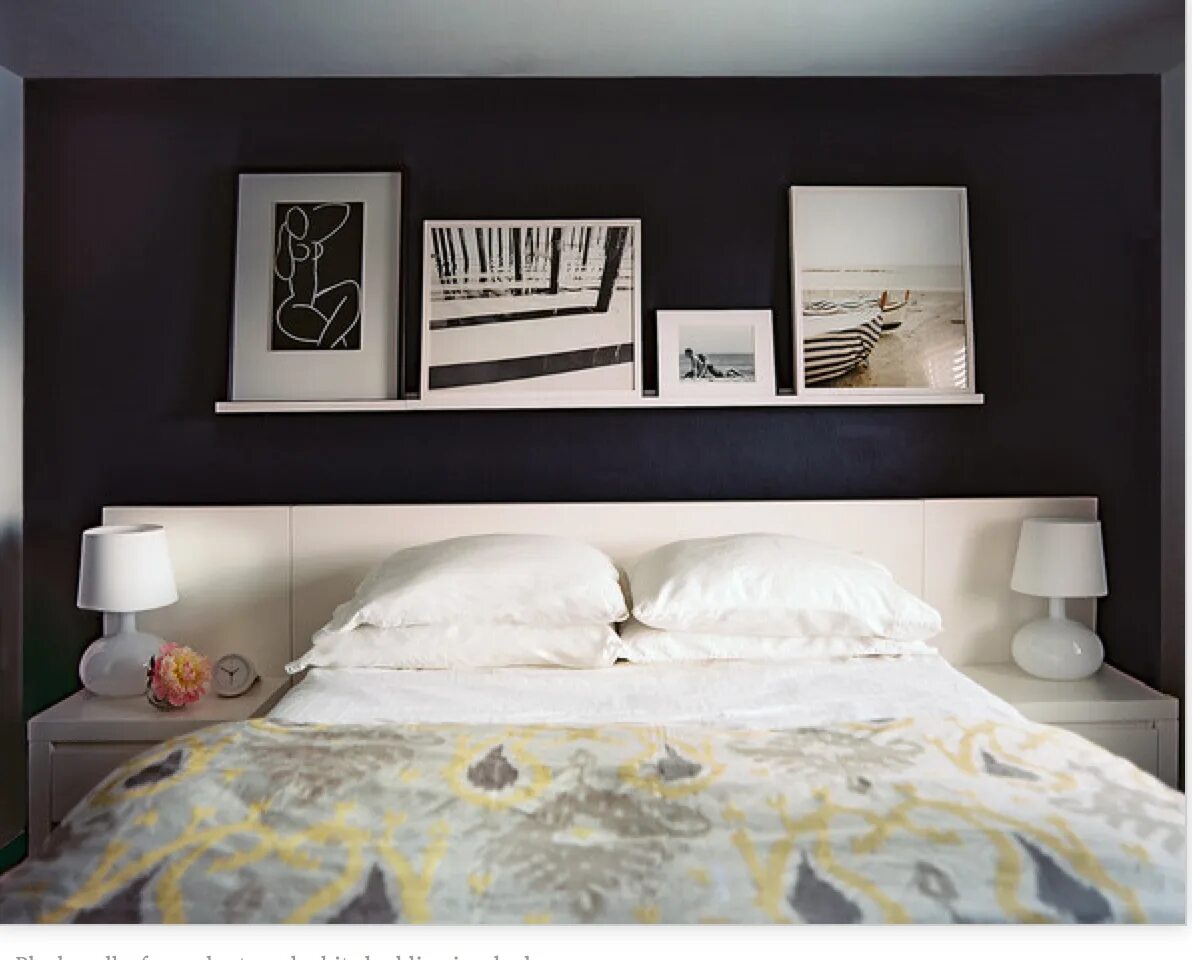 Постер в интерьере спальни Dark Paint frames the bed with a photo rail above the bed Bedroom wall decor abo