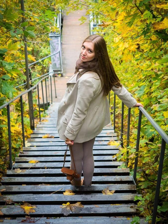 Позы для фото на лестнице Girl Walking Down the Stairs on a Beautiful Autumn Day Stock Image - Image of go