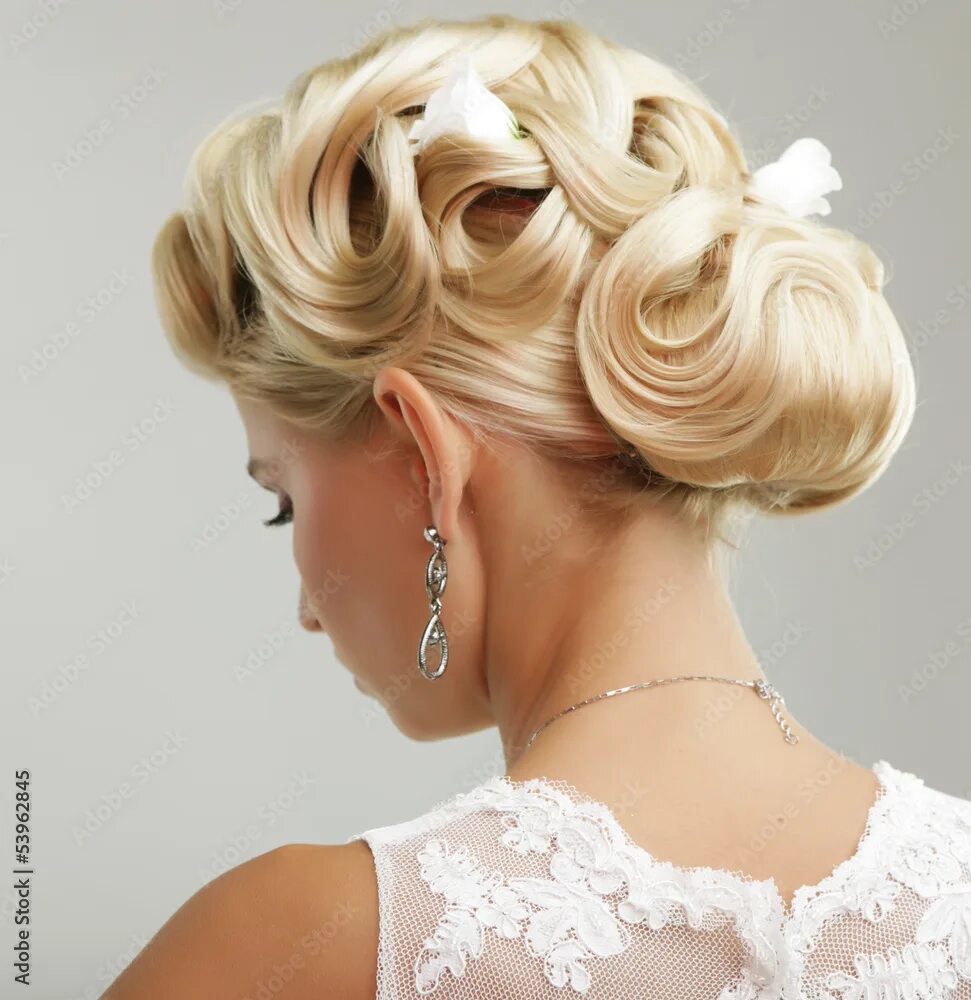 Праздничные прически на средние волосы Beauty wedding hairstyle. Bride Фотографія Stock Adobe Stock