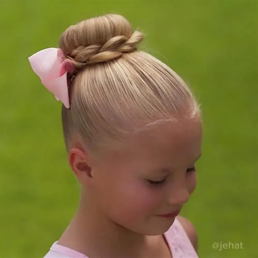 Прическа для девочки средние фото Ballet bun with couple braids wrapped around & wearing a pink tutu dress for chu