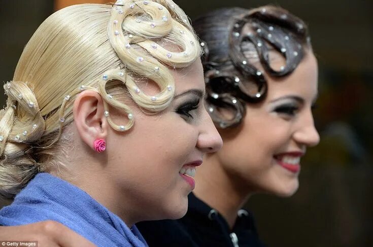 Прическа с волосами на глазах Pearly queens: Professional dancers with elegant pearly up-dos smile as they wat