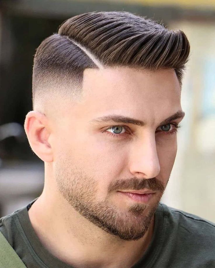 Прическа там Man with slick quiff hairstyle, hard parting and high bald fade Hard part haircu