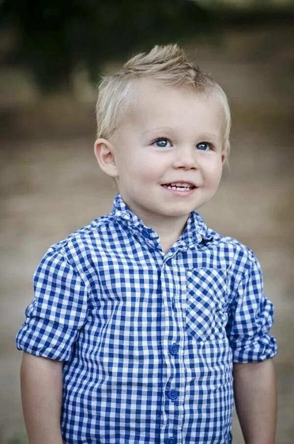 This little guy with amazing hairstyle is Colton, from Florida. He and his 3 sib