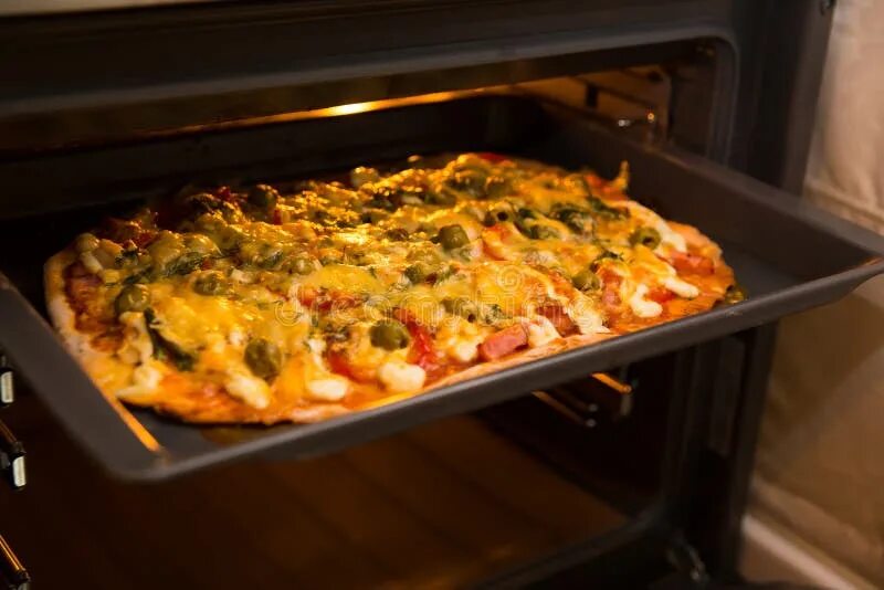 Приготовление пиццы в духовке фото Baking pizza in oven. stock photo. Image of lunch, cook - 44900320