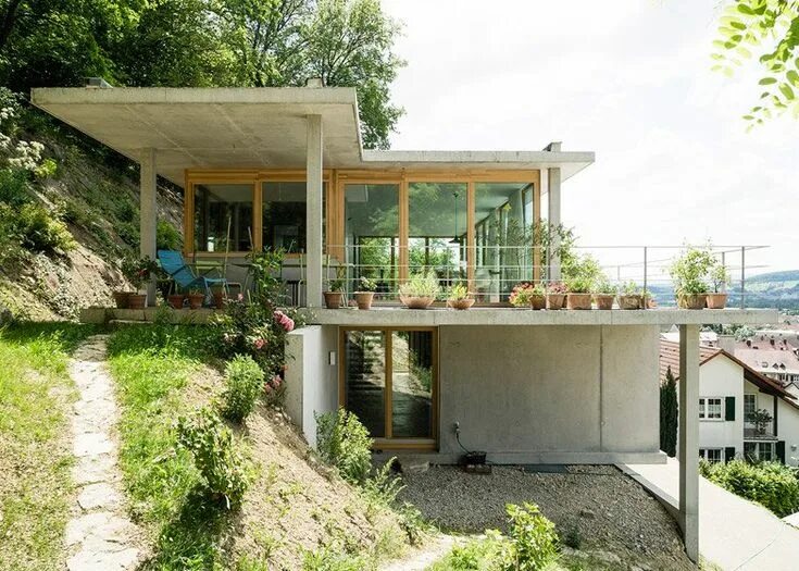 Примеры про дом Gian Salis' House on a Slope terraces down hillside Slope house design, Sloping 