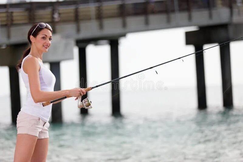 Приснилось что ловила рыбу на удочку Woman Casting a Fishing Pole Stock Image - Image of water, caucasian: 42372319