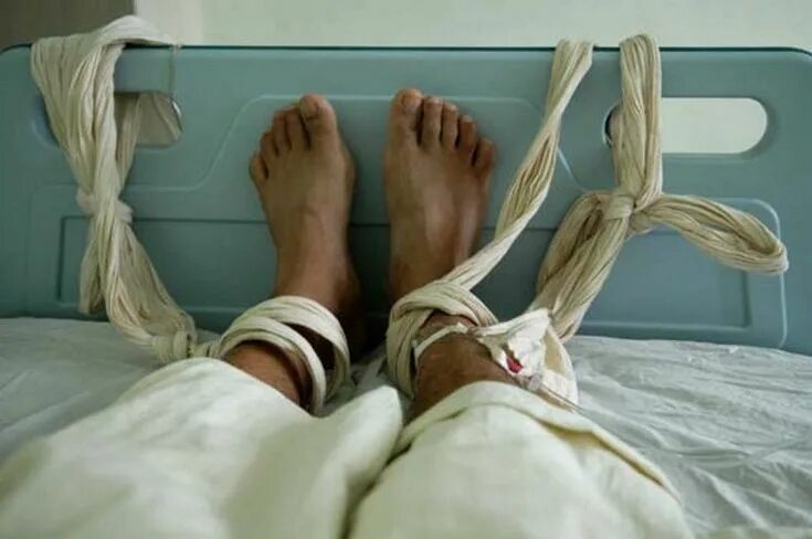 Привязанная кровати фото A file photo of a patient at a psychiatric hospital in Fuzhou receiving a blood 