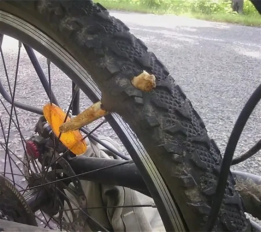 Bicycle Wheel with Flat Tyre on the Concrete Road. Stock Image - Image of bike, 