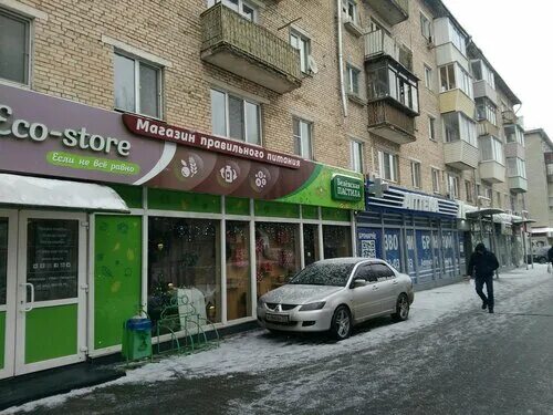 The picture shows the building of the cinema "October" on Krasnoarmeysky Avenue,