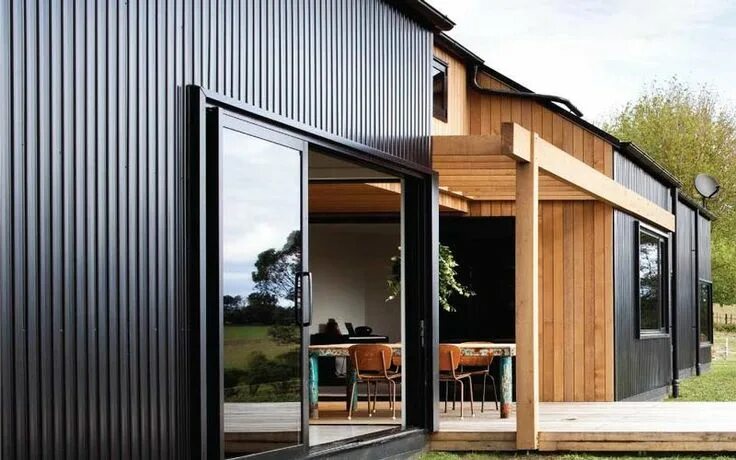 Профнастил для частного дома фото stained cedar cladding vertical with metal cladding - black House cladding, Meta